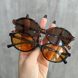 DAIIIBABYYY   -  Vintage Oval Sunglasses 2024 Leopard Black Designer Small Oval Sun Glasses Retro Fashion Women Sunscreen Glasses Gifts UV400