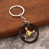 DAIIIBABYYY  -  Hot Sale Racing Steering Wheel Keychain Personality Modified Car Key Chain 6 Speed Gearbox Creative Model Metal Key Chain Gift