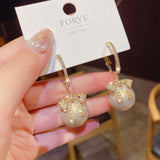 2021 New Fashion Korean Oversized White Pearl Drop Earrings for Women Bohemian Golden Round Zircon Wedding Earrings Jewelry Gift daiiibabyyy